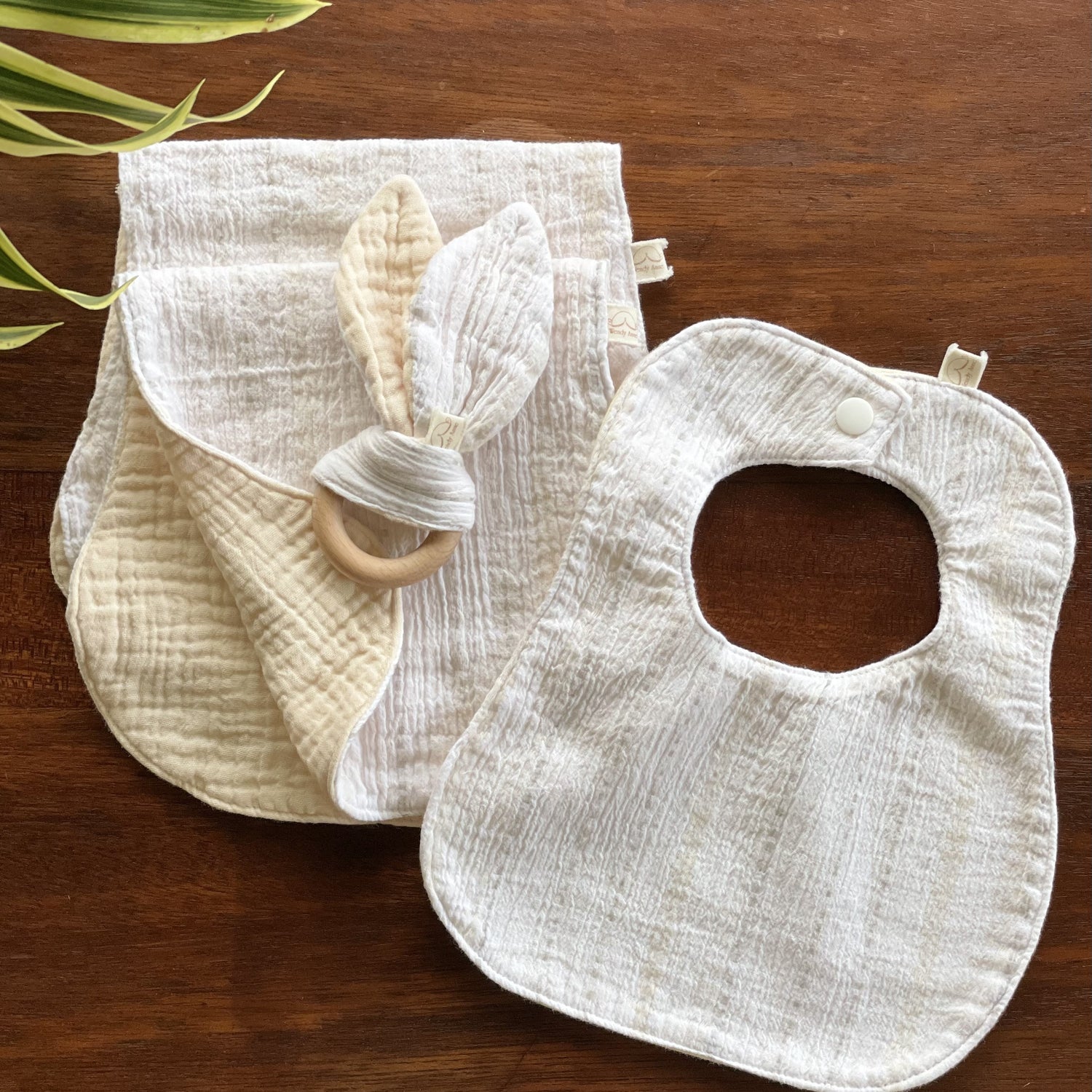 organic cotton bib, two burp cloths and teether