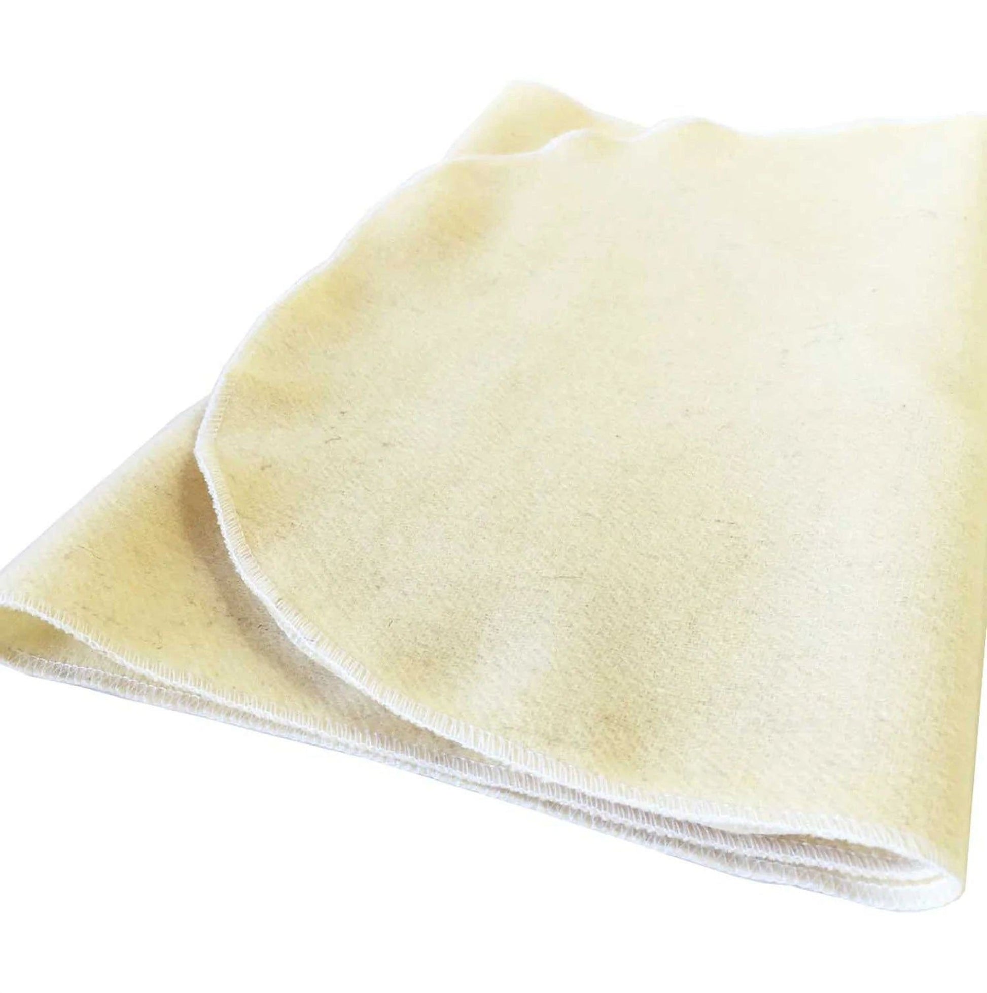 A folded, white fabric item, possibly a blanket or towel, is shown against a white background.