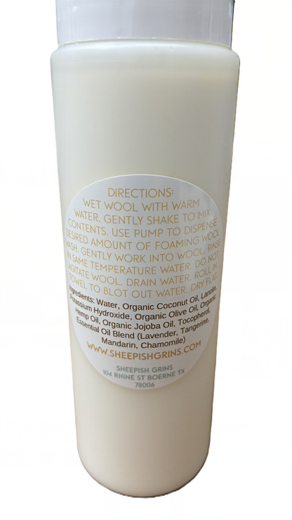 a bottle of liquid soap with a label that provides directions and ingredients.
