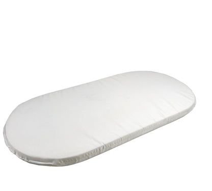 A white oval-shaped object, possibly a mattress or cushion, is shown against a white background.