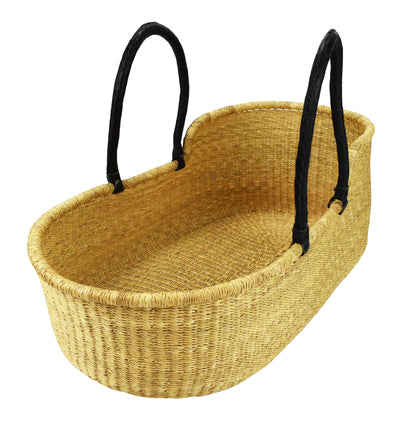 A woven basket with black handles, designed for carrying or storage.